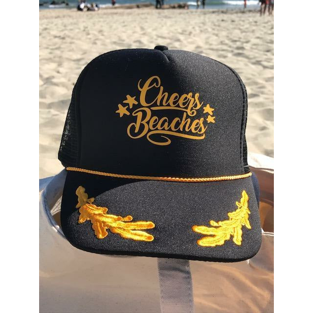 https://www.cheersbeaches.com/cdn/shop/products/cheers-beaches-cheers-beaches-captain-s-trucker-hat-940079972358_2048x.jpg?v=1658810610