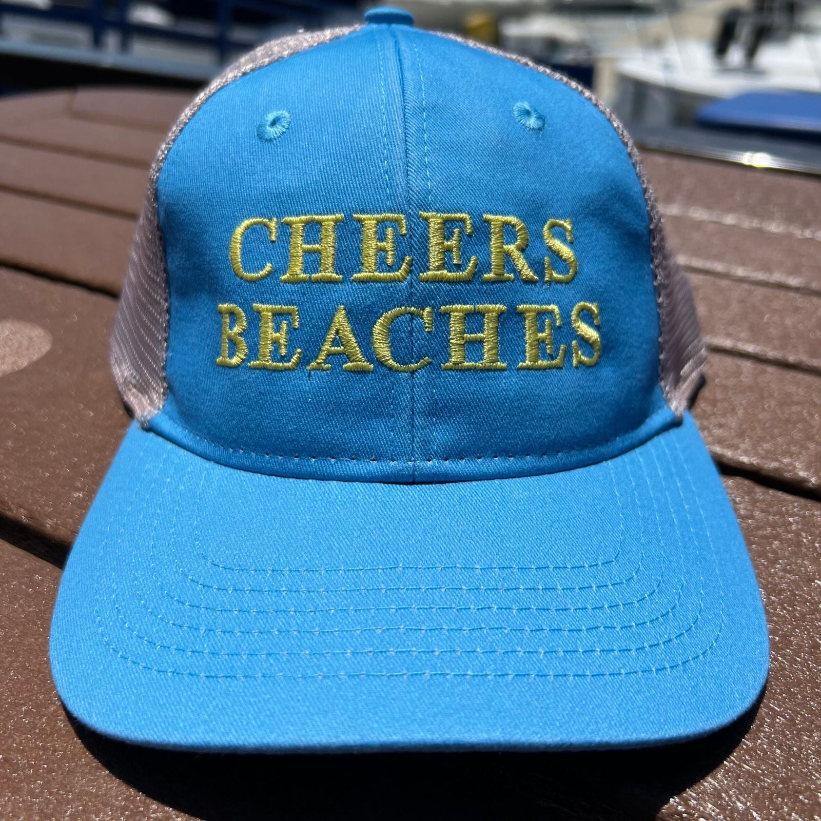 Cheers Beaches Embroidered Ponytail Trucker Hat: Sky Blue & Sand - Cheers Beaches